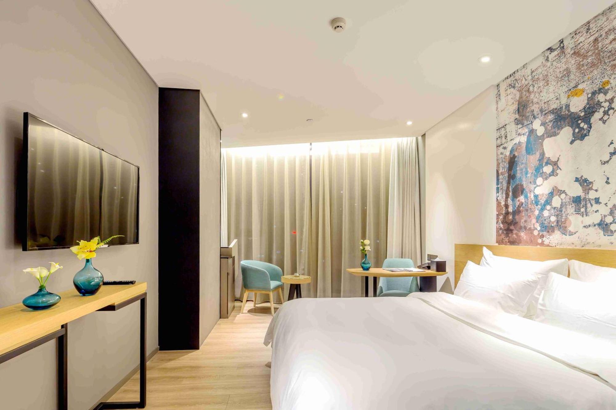 M Hotel Чженчжоу Екстер'єр фото