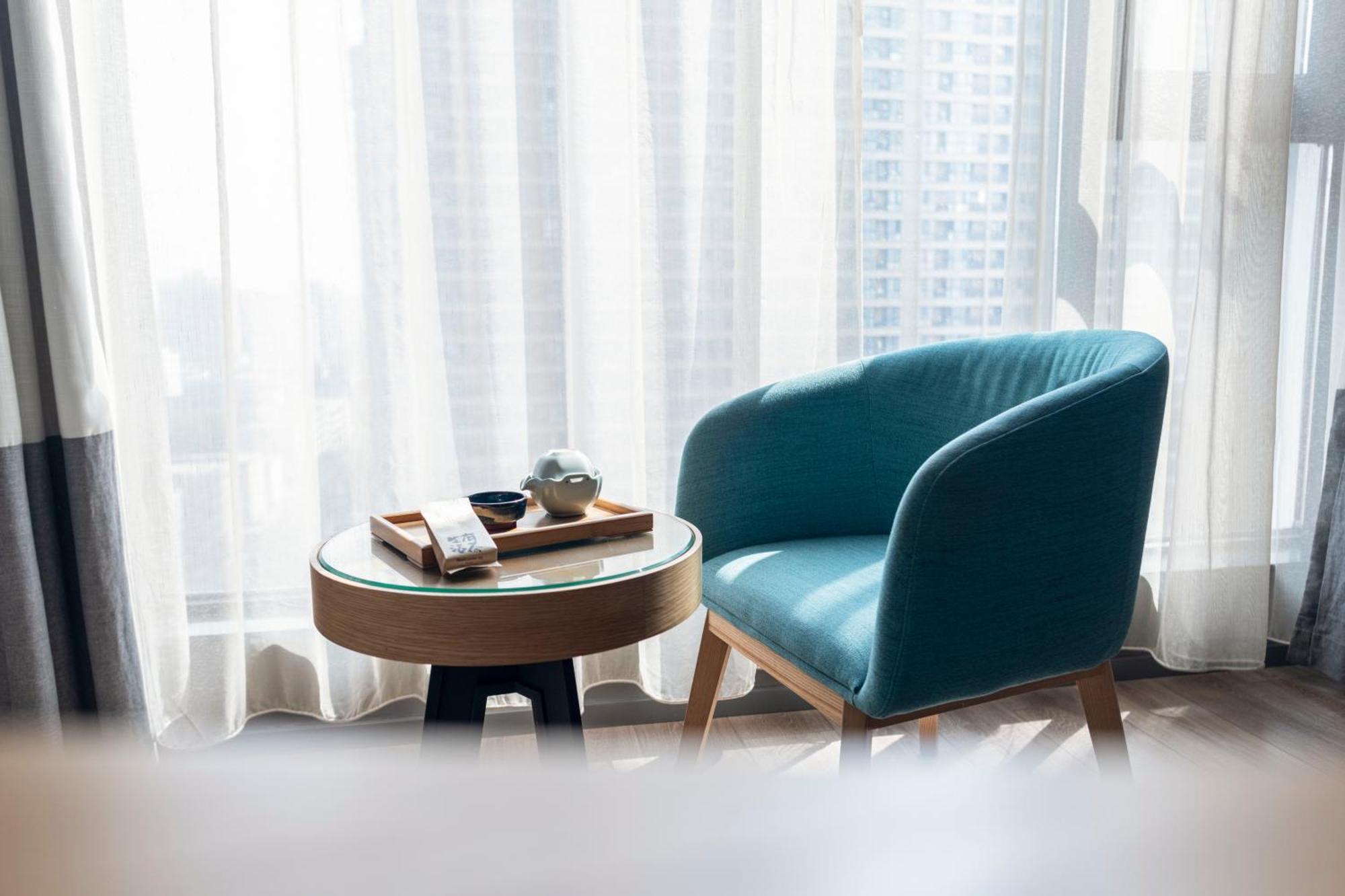 M Hotel Чженчжоу Екстер'єр фото