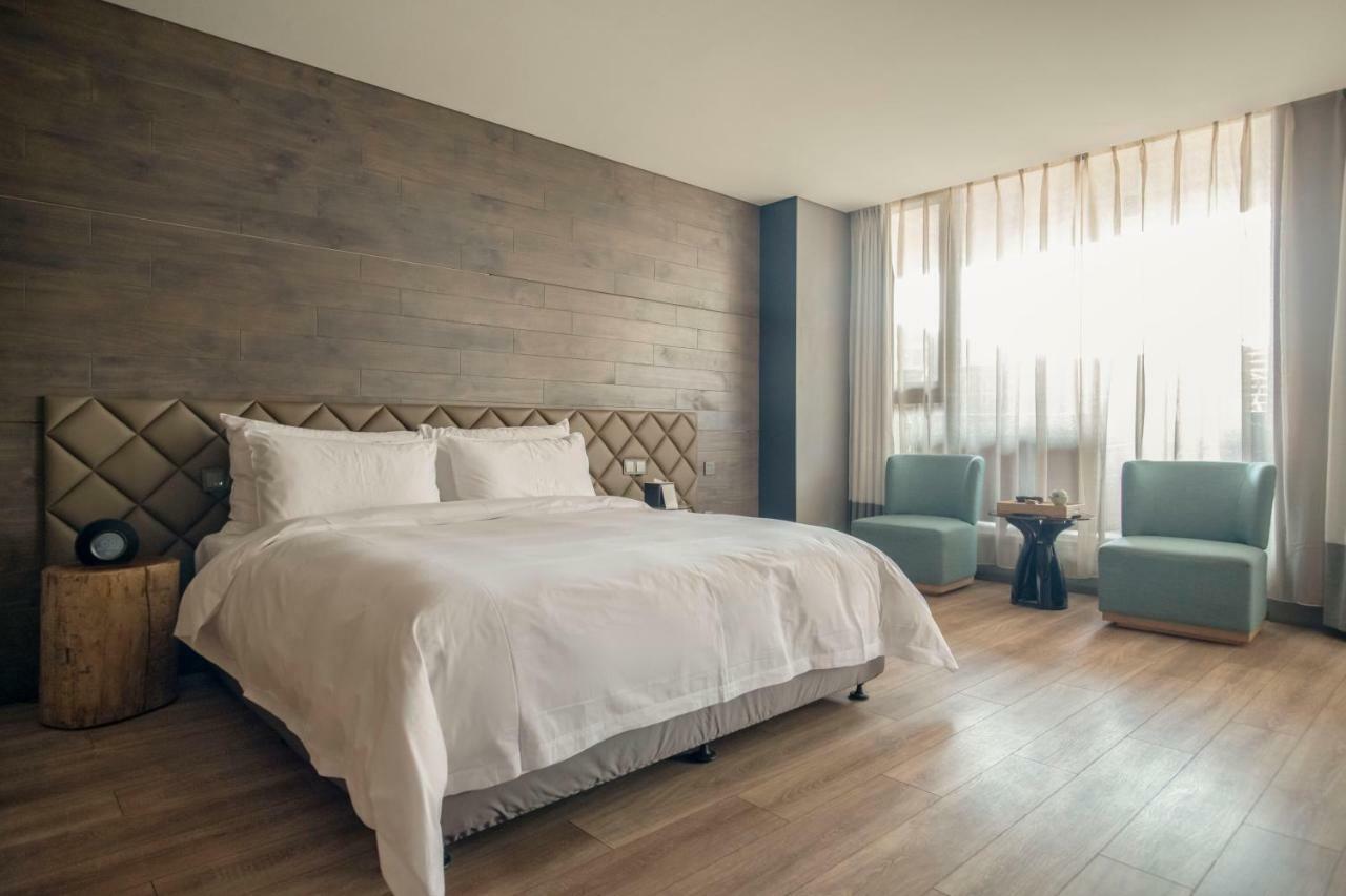 M Hotel Чженчжоу Екстер'єр фото