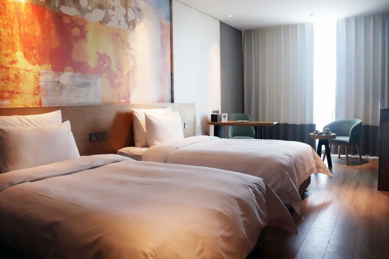 M Hotel Чженчжоу Екстер'єр фото